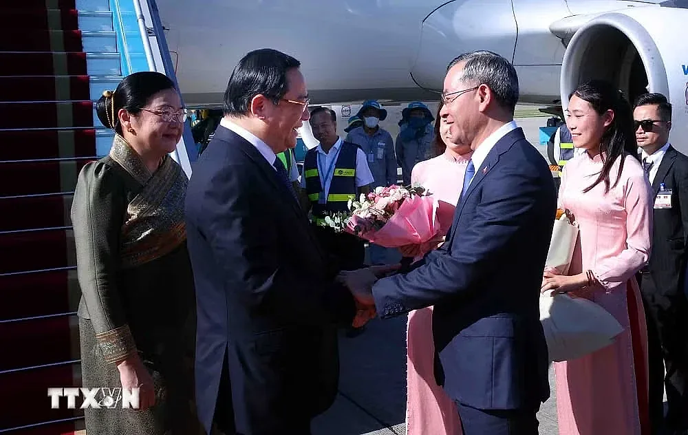 Thủ tướng Lào đến Hà Nội, bắt đầu thăm chính thức Việt Nam và dự AFF 2026- Ảnh 2.